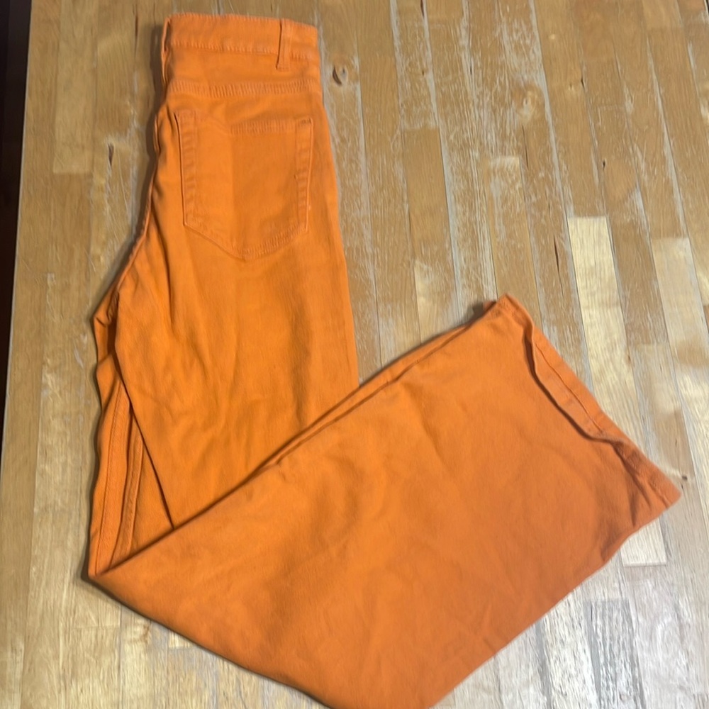 Divided flared leg orange jeans